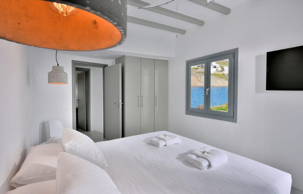 bedroom overlooking the clear blue sea and comfortable king size bed