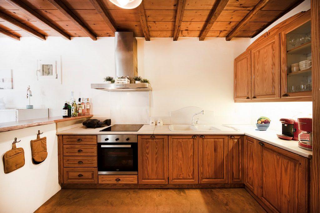 traditionally designed kitchen with wooden elements and modern appliances