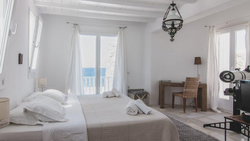bedroom overlooking the glistening sea and lots of daylight